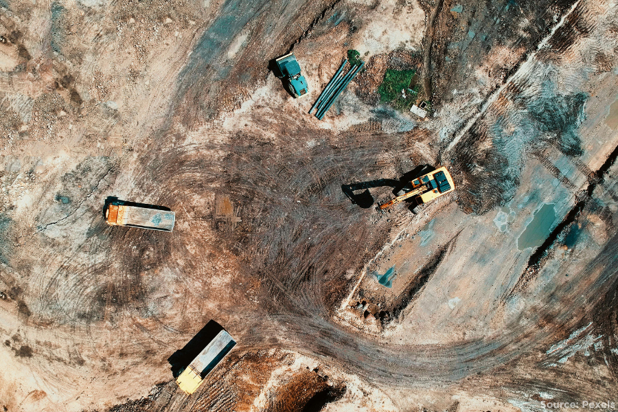land being cleared by trucks